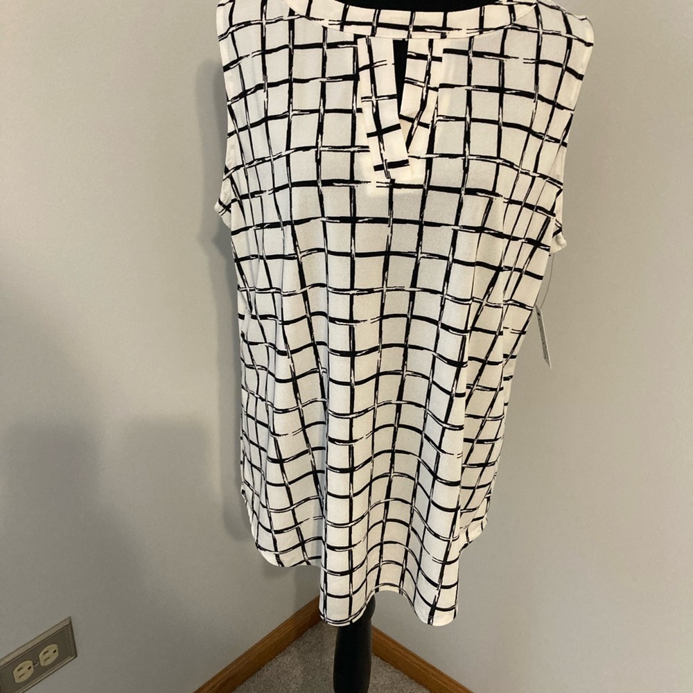 Ladies top.  New with tags.  Brand Cure, size 1xl